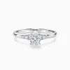 Oval-cut Side-stone Engagement Ring in 14k White Gold