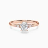 Oval-cut Side-stone Engagement Ring in 14k White Gold